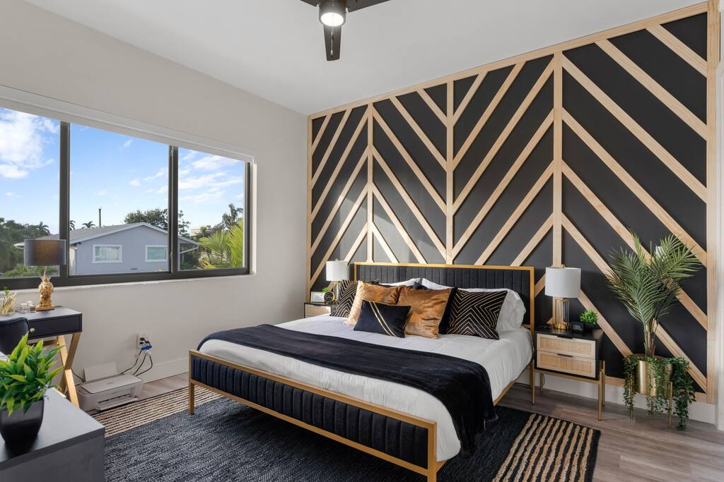 [King Suite] - memory foam mattress, memory foam and down pillows, custom wood accent wall, workstation